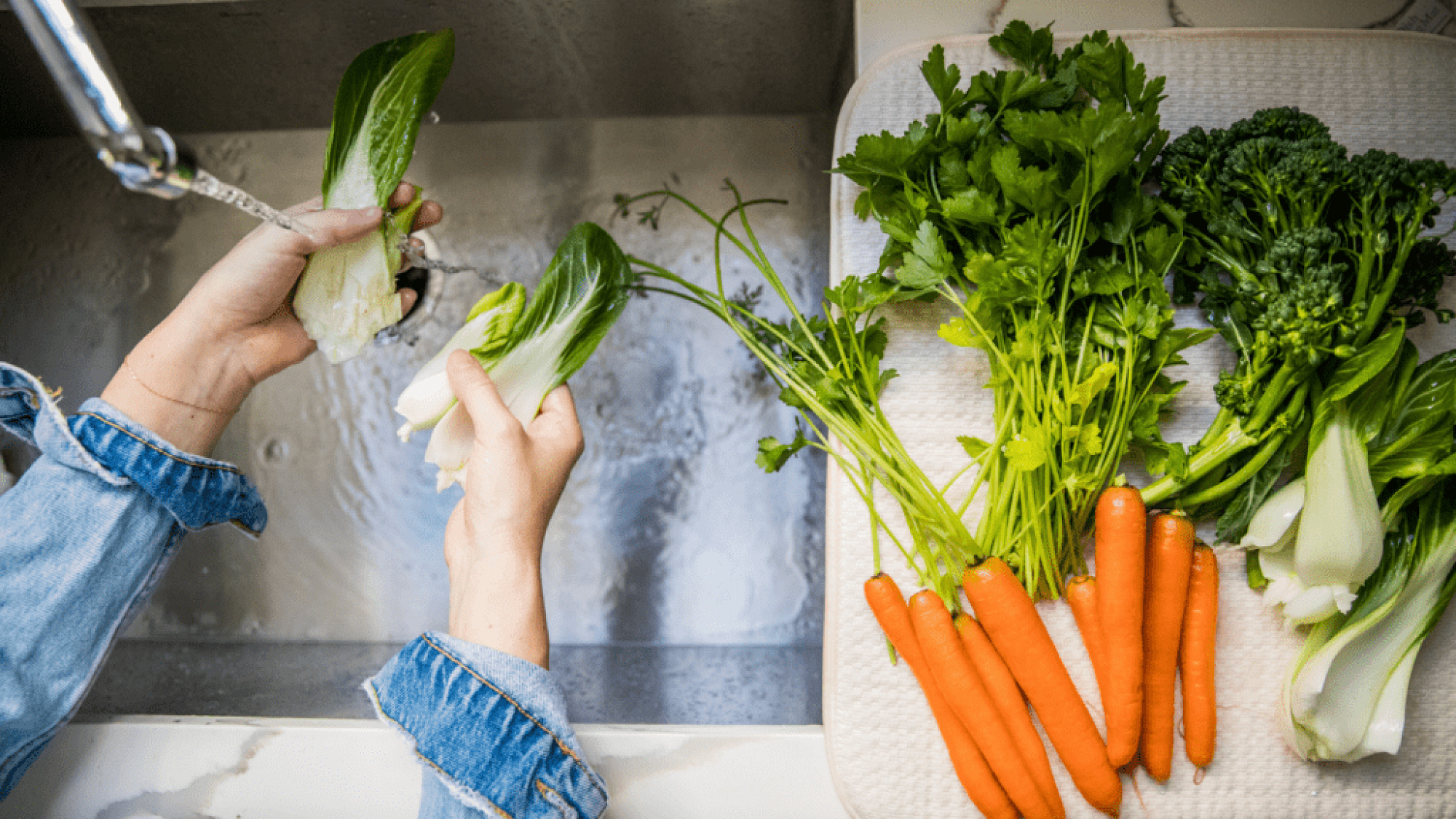 washing produce in sink